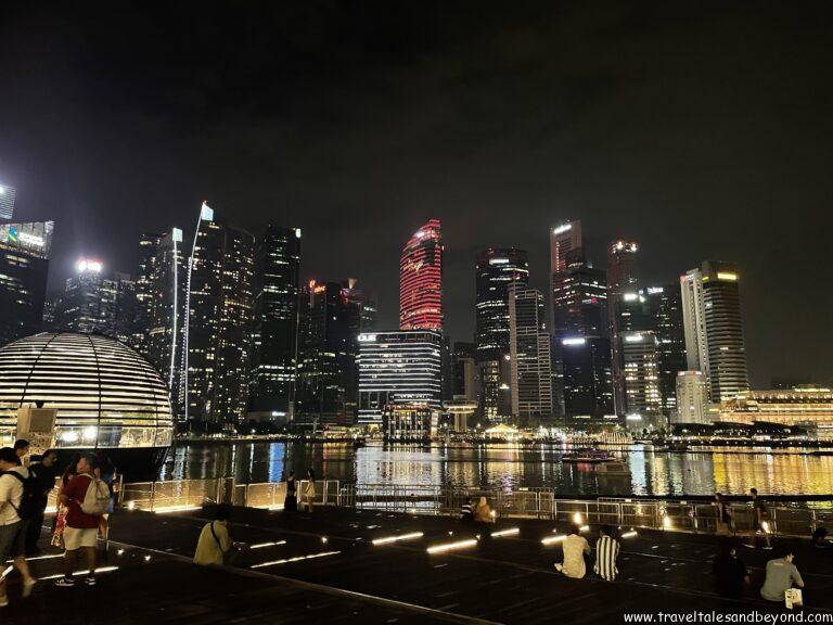 Singapore city skyline at night during overnight layover