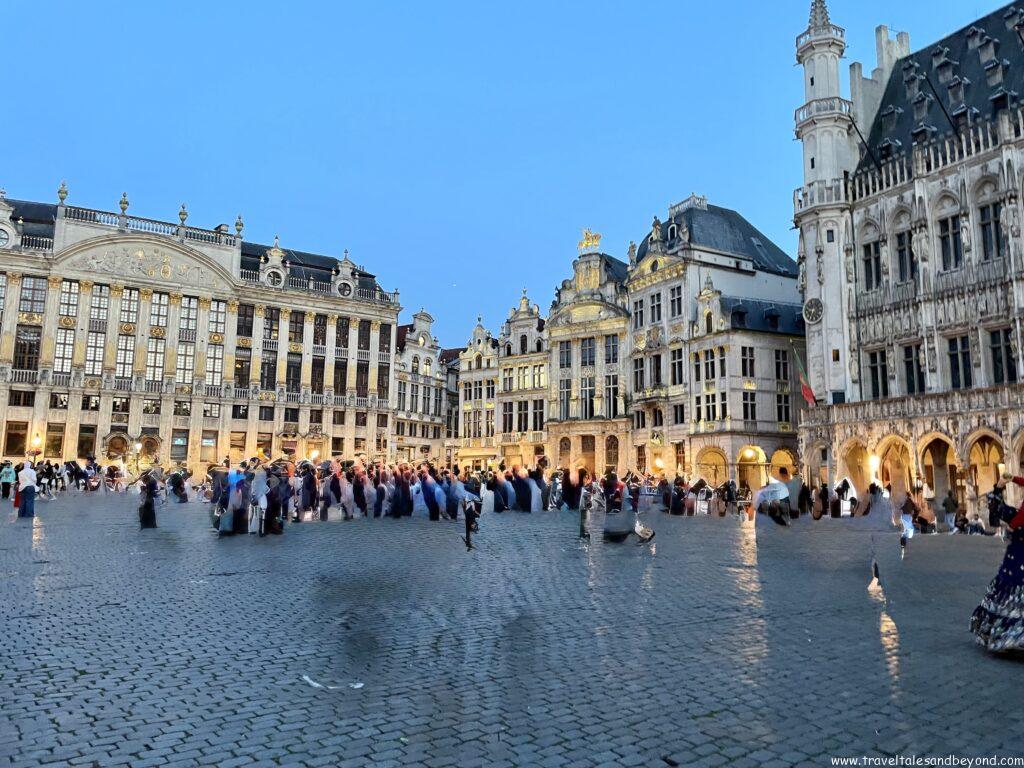 Grand Place square lit up at night with ornate guild buildings, Brussels, Belgium