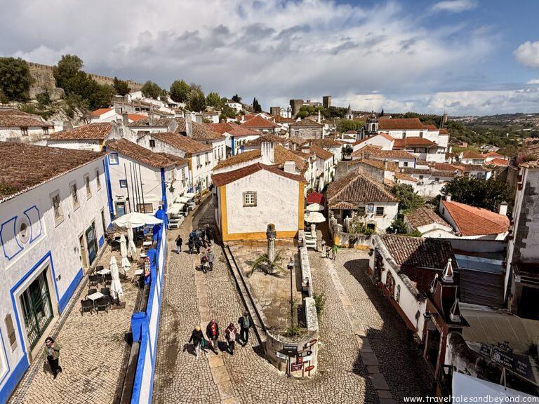 Whitewashed medieval walls and cobblestone streets of Óbidos, Portugal