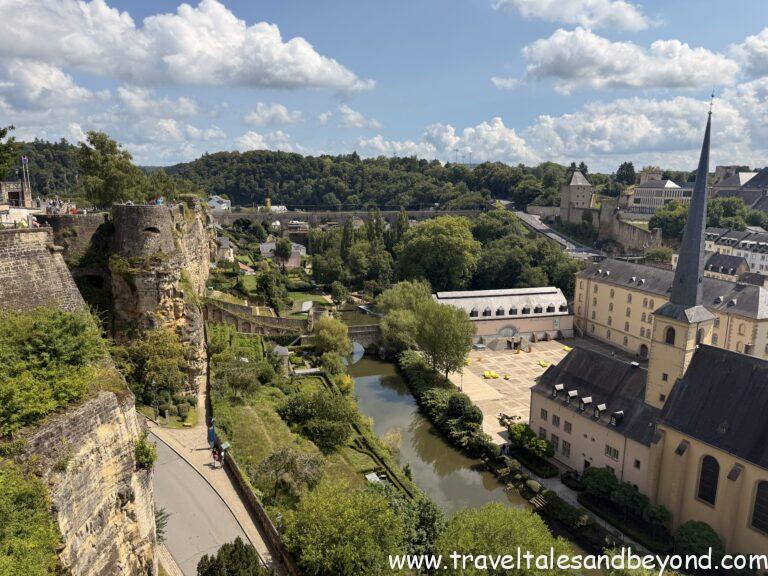 Panoramic view of the Alzette Valley from Chemin de la Corniche, showing the Grund district and ancient fortification walls below