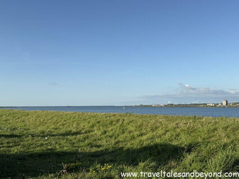 Dykes - water on one side, farmland sitting lower on the other.