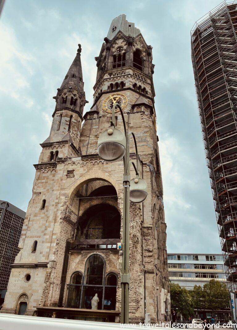 Ruins of Kaiser Wilhelm Memorial Church (Gedächtniskirche) with damaged bell tower preserved as World War II memorial, Kurfürstendamm, Berlin, Germany