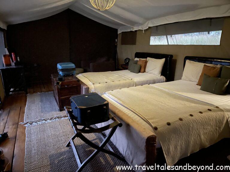 Carry-on bags packed for Tanzania safari inside tented camp — family safari packing example