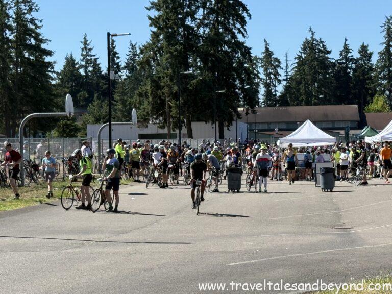 Riders taking a lunch break during Day 1 of the STP, with food laid out and bikes resting nearby