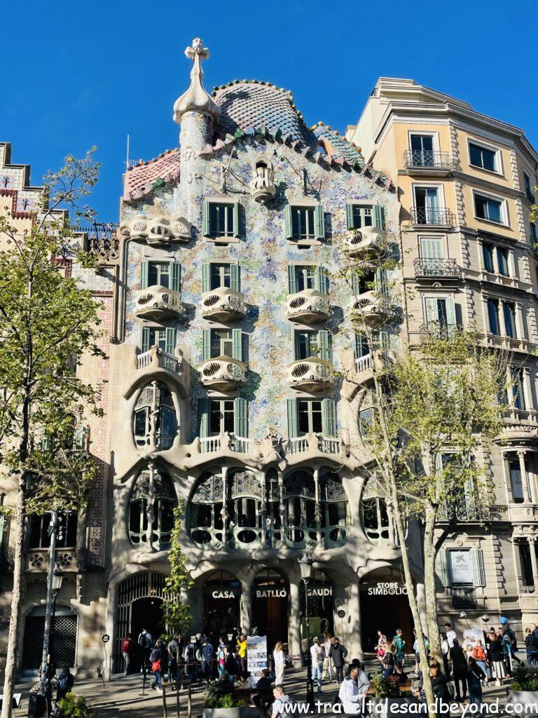 Colorful mosaic facade of Casa Batlló designed by Antoni Gaudí on Passeig de Gràcia, Barcelona, Spain