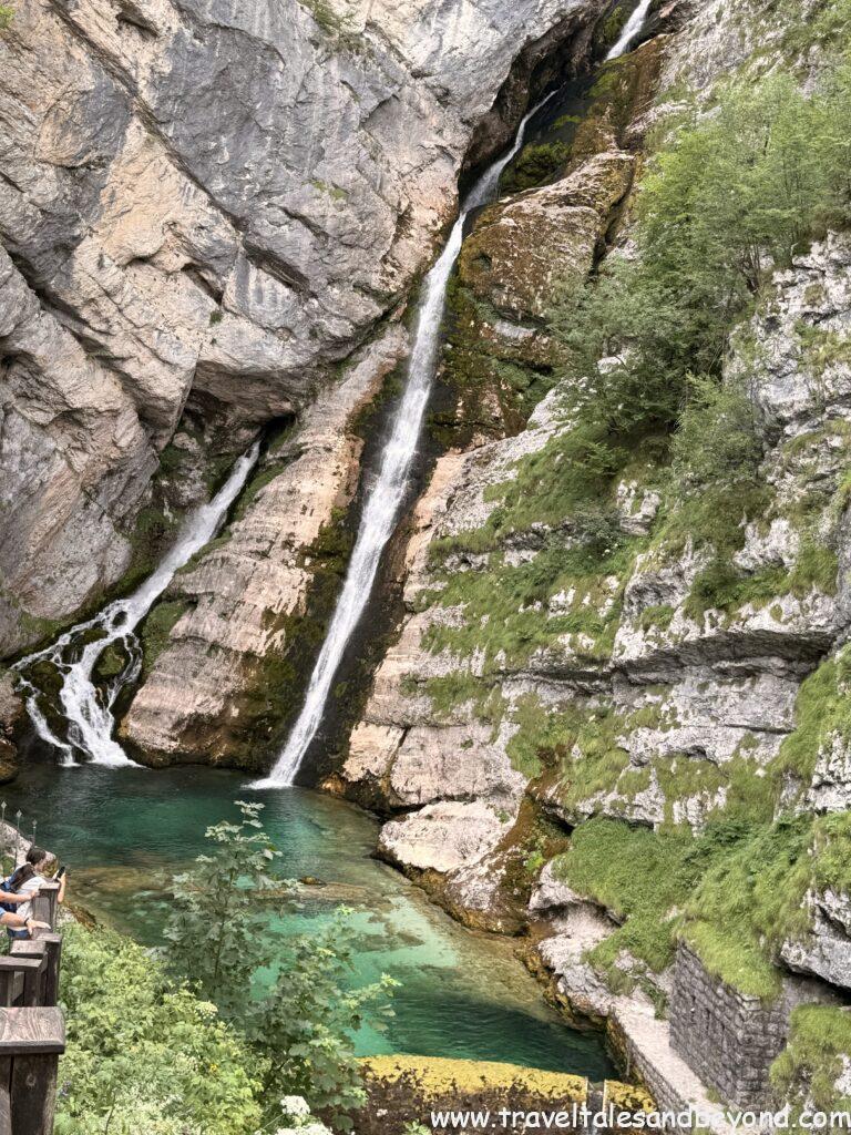 Slap Savica waterfall dropping into an emerald pool near Lake Bohinj